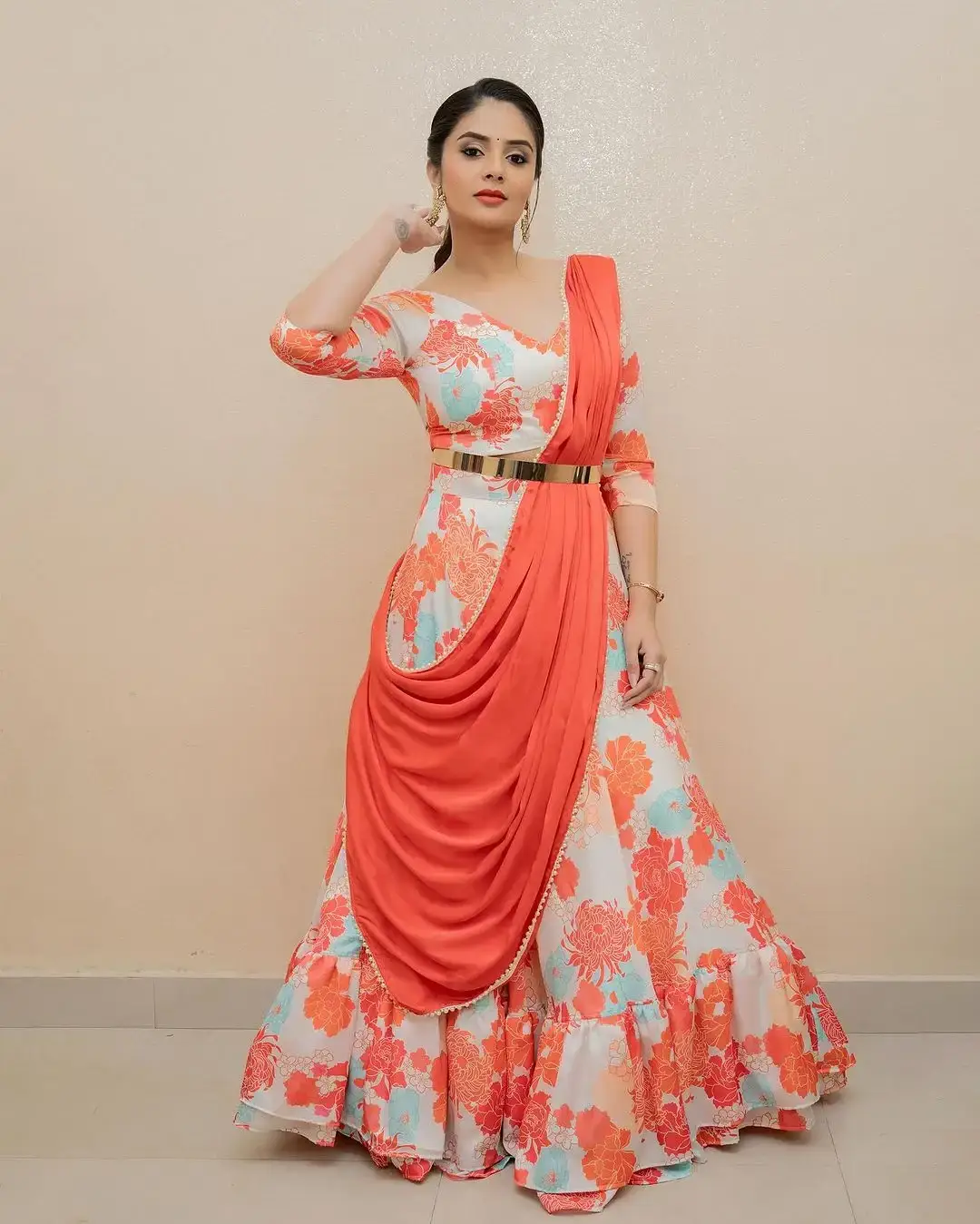 Beautiful Indian Actress Sreemukhi in Orange Lehenga Choli